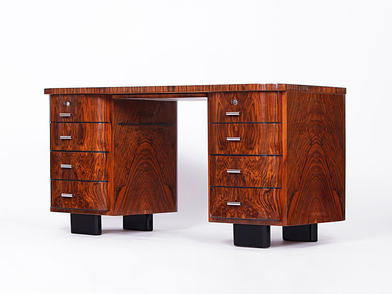 Rare model from UP Zavody and even then the most expensive desk from the entire production.
Craftsmanship to perfection and a distinctive Caucasian walnut veneer make the H-178 a total 
eye-catcher that dominates your room. Because there are almost