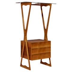 Freestanding Valet featuring drawers, shelves, and a coat rack, Italy, 1950s.