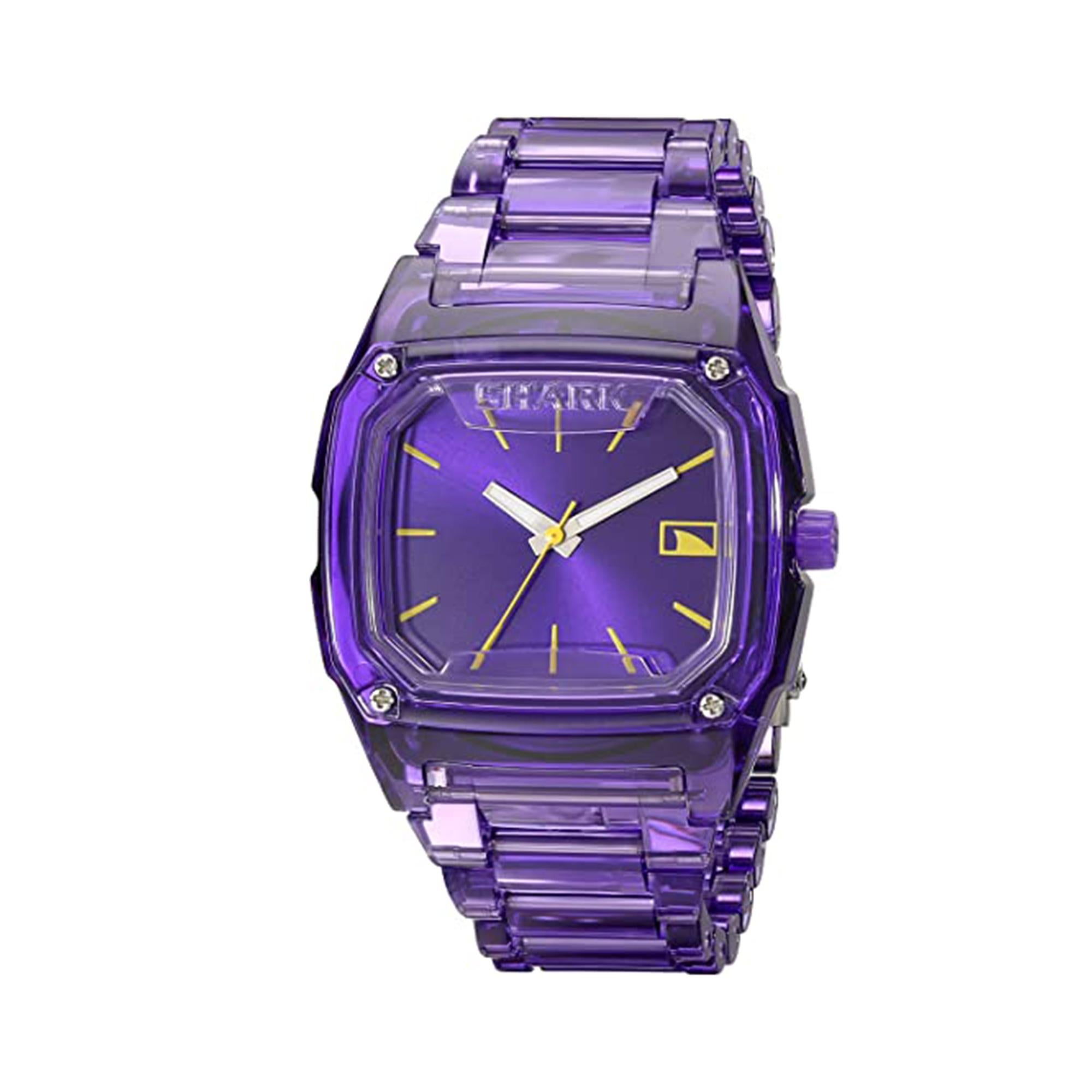 This timepiece features a 38mm wide and 12mm thick purple translucent polycarbonate plastic case with a fixed bezel and textured push-down crown. 
It is powered by a Japanese quartz movement. This watch also features a sharp looking purple dial with