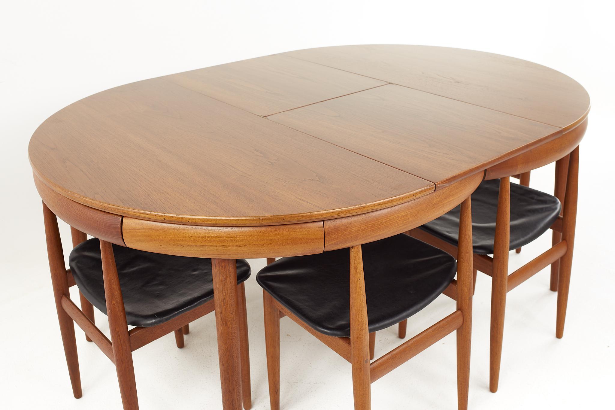 Frem Rojle Mid-Century Teak Hidden Leaf Dining Table with 6 Nesting Chairs 1