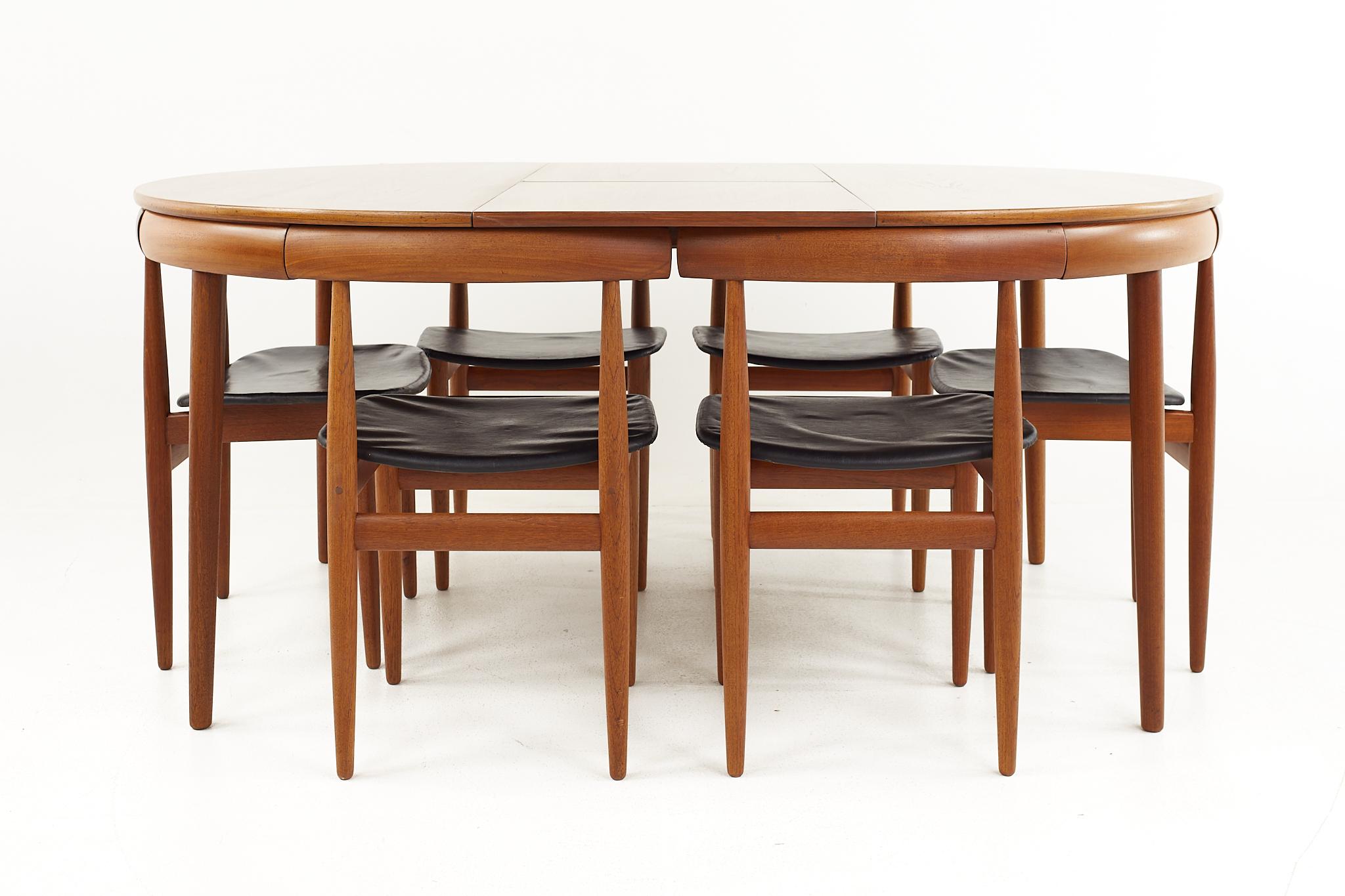 Frem Rojle Mid-Century Teak Hidden Leaf Dining Table with 6 Nesting Chairs 2