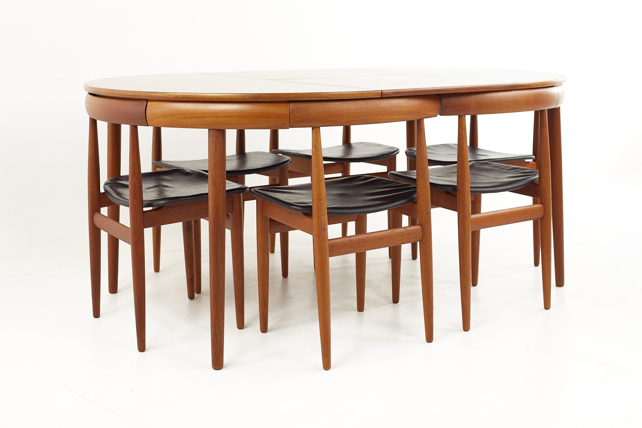 Frem Rojle Mid-Century Teak Hidden Leaf Dining Table with 6 Nesting Chairs 3