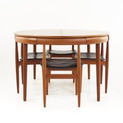 Frem Rojle Mid-Century Teak Hidden Leaf Dining Table with 6 Nesting Chairs