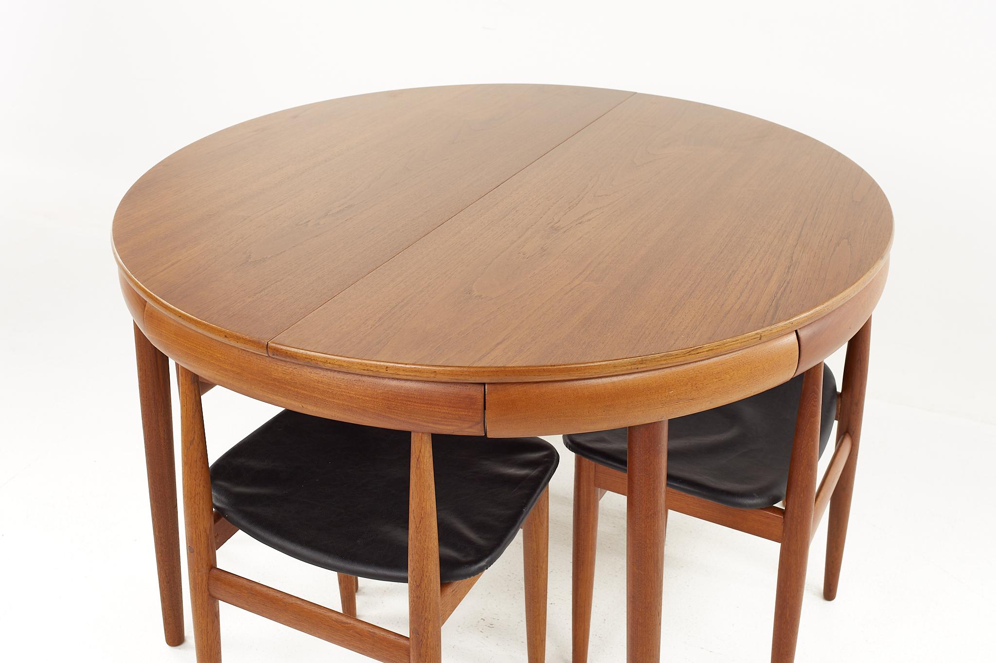 Frem Rojle Mid-Century Teak Hidden Leaf Dining Table with 6 Nesting Chairs In Good Condition In Countryside, IL