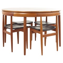 Frem Rojle Mid-Century Teak Hidden Leaf Dining Table with 6 Nesting Chairs