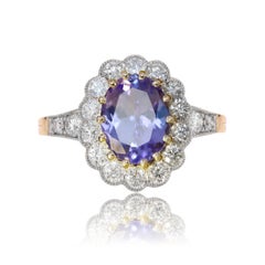 French 1, 87 Carat Tanzanite Diamonds 18 Karat Yellow Gold Platinum Daisy Ring