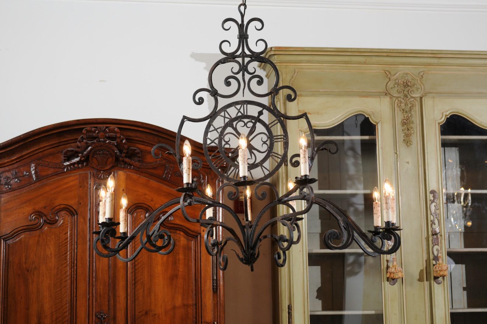 French 12-Light Wrought-Iron Chandelier with Clock Motif and Scrolling Armature For Sale 5