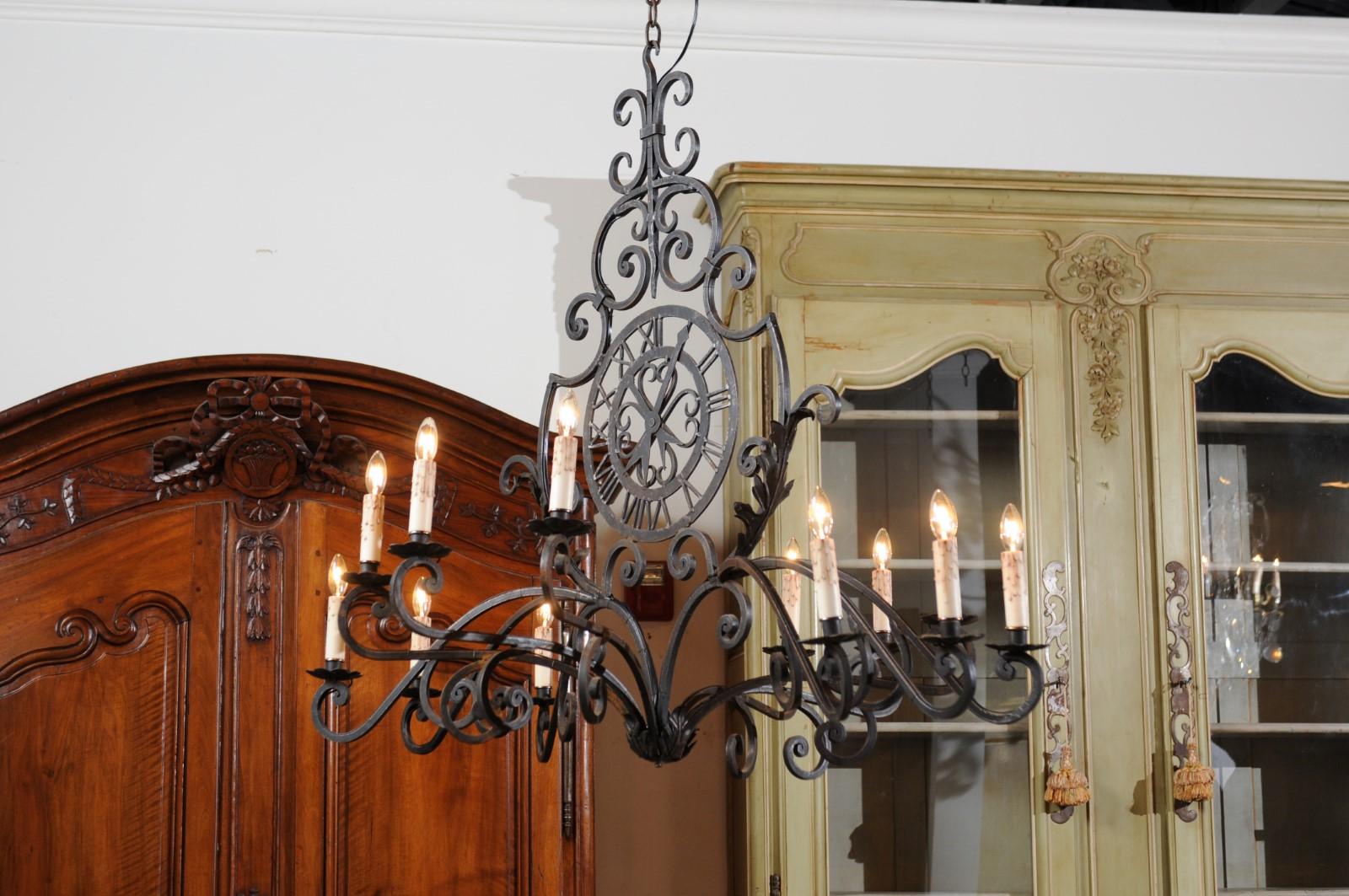 French 12-Light Wrought-Iron Chandelier with Clock Motif and Scrolling Armature For Sale 6