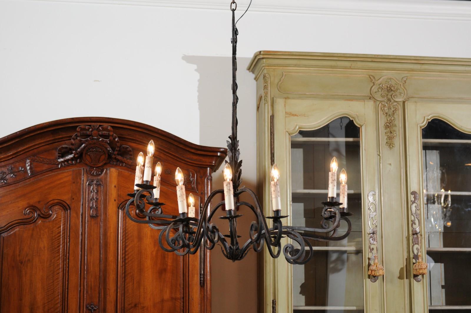 French 12-Light Wrought-Iron Chandelier with Clock Motif and Scrolling Armature For Sale 7