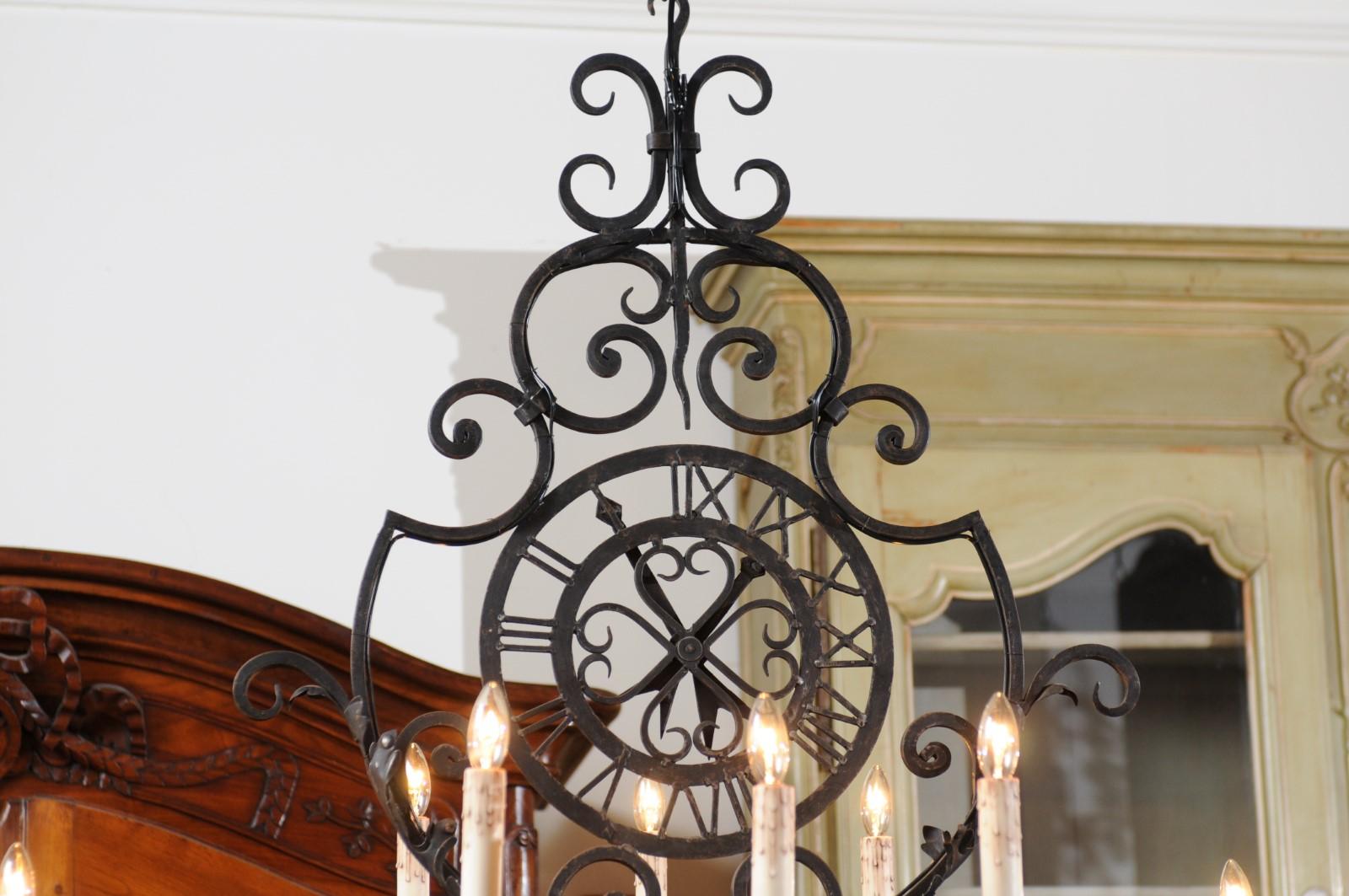 French 12-Light Wrought-Iron Chandelier with Clock Motif and Scrolling Armature For Sale 2