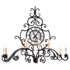 French 12-Light Wrought-Iron Chandelier with Clock Motif and Scrolling Armature