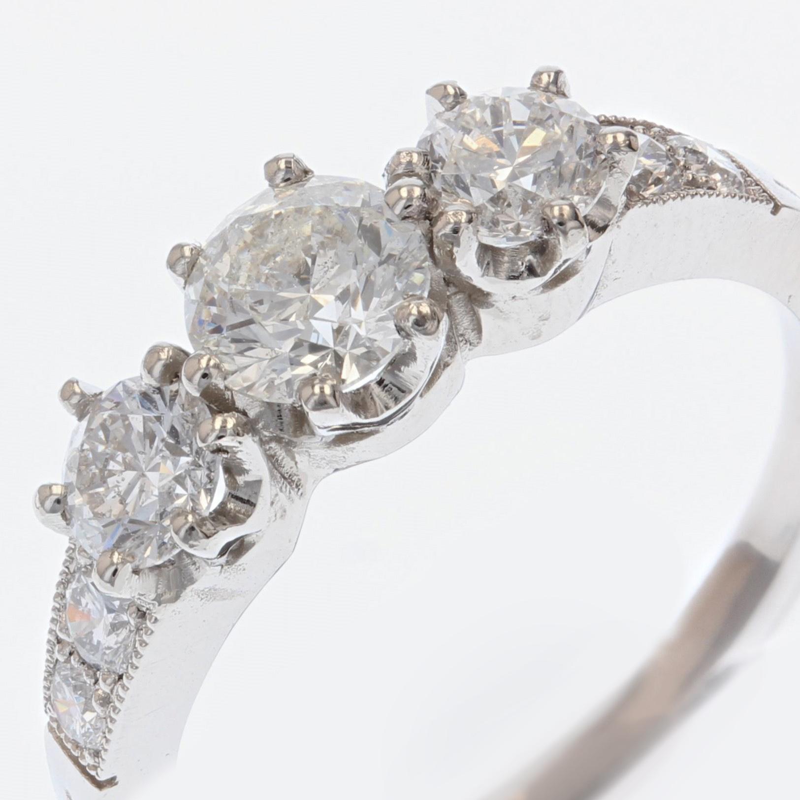 Women's French 1.27 Carat Brillant Cut Three Stone Platinum Ring For Sale
