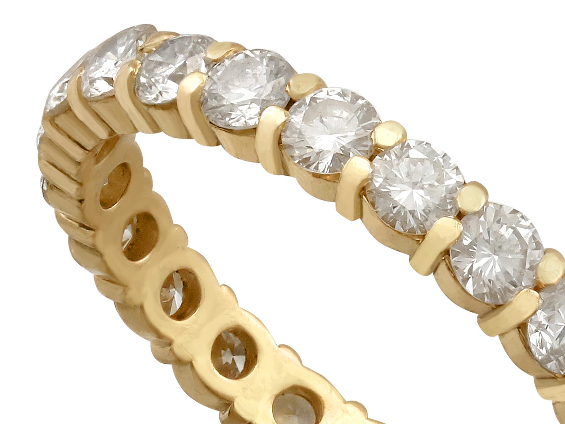 An impressive vintage French 1.32 carat diamond and 18 karat yellow gold full eternity ring; part of our diverse antique jewelry and estate jewelry collections.

This fine and impressive vintage eternity ring has been crafted in 18k yellow