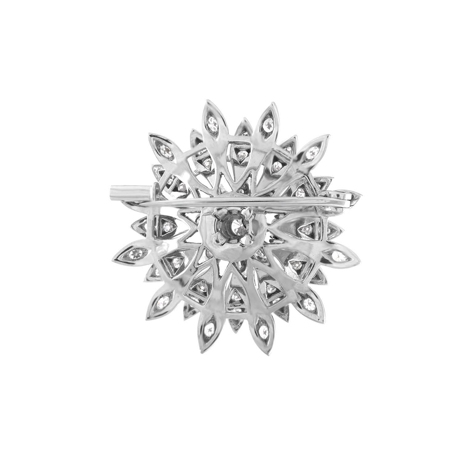 Beautiful Delicate Flower Brooch
The brooch is 18K White Gold
There are 1.50 Carats in Diamonds E/F VS
The brooch measures almost 1.25