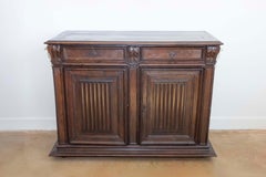 French 16th Century Henri II Period Walnut Buffet with Folded Cloth Ornaments