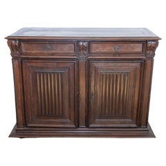 French 16th Century Henri II Period Walnut Buffet with Folded Cloth Ornaments