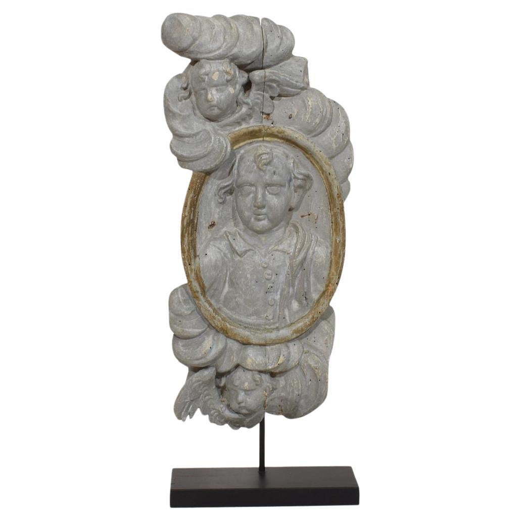 French 17/ 18th Century Carved Wooden Baroque Panel Depicting A Saint And Angels For Sale