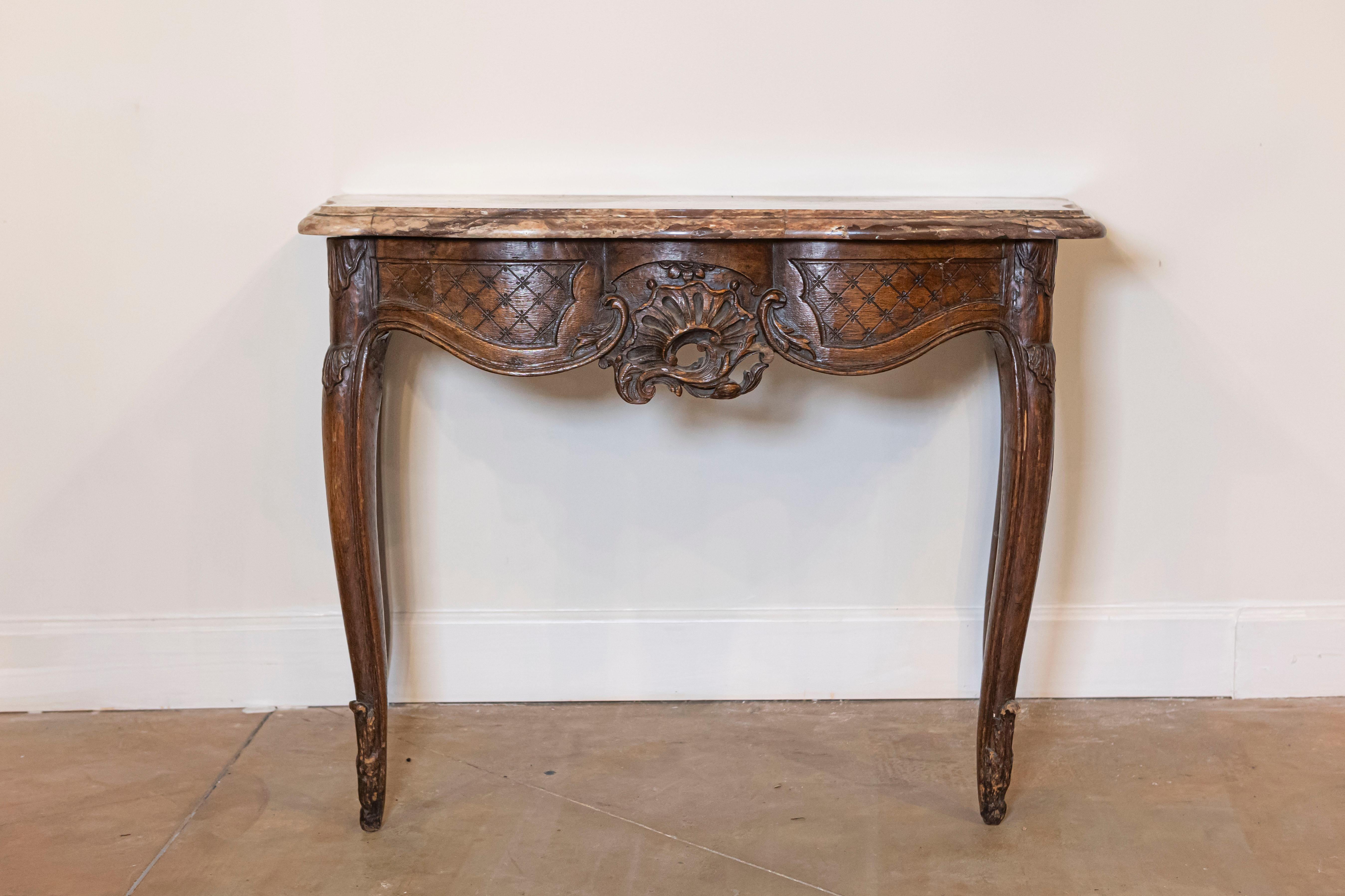 Carved French 1720s Régence Period Walnut Console Table with Original Marble Top For Sale