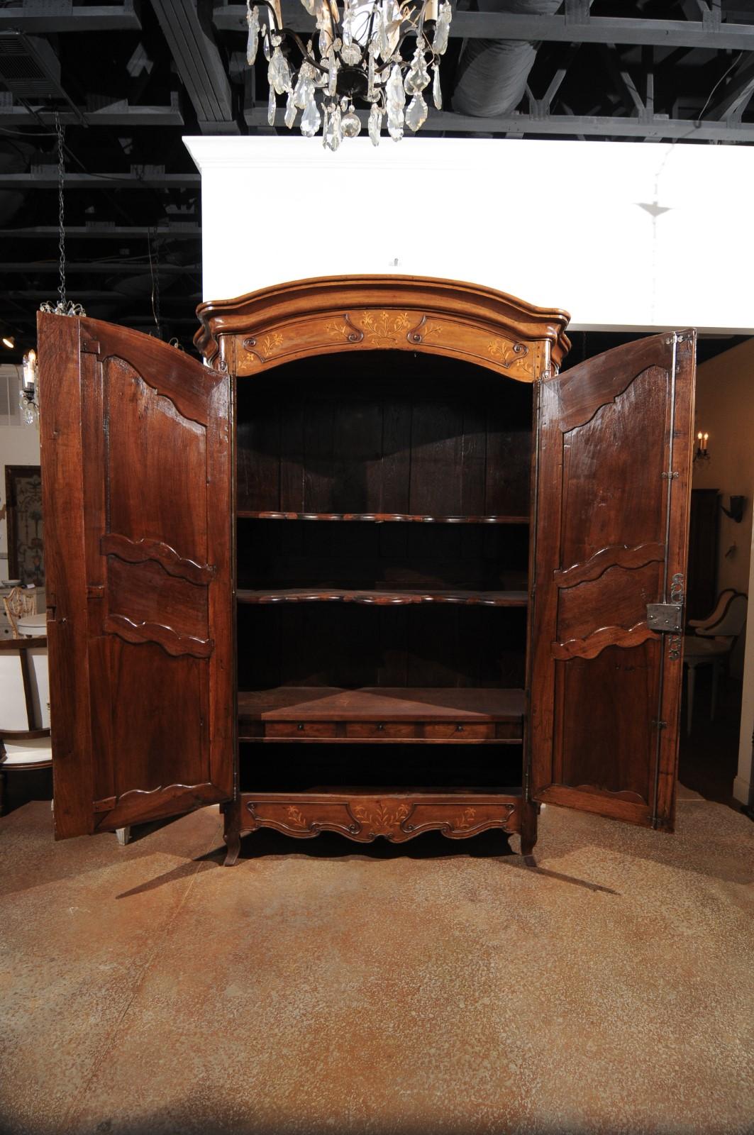 French 1730s Louis XV Walnut Armoire from the Rhône Valley with Floral Inlay In Good Condition In Atlanta, GA