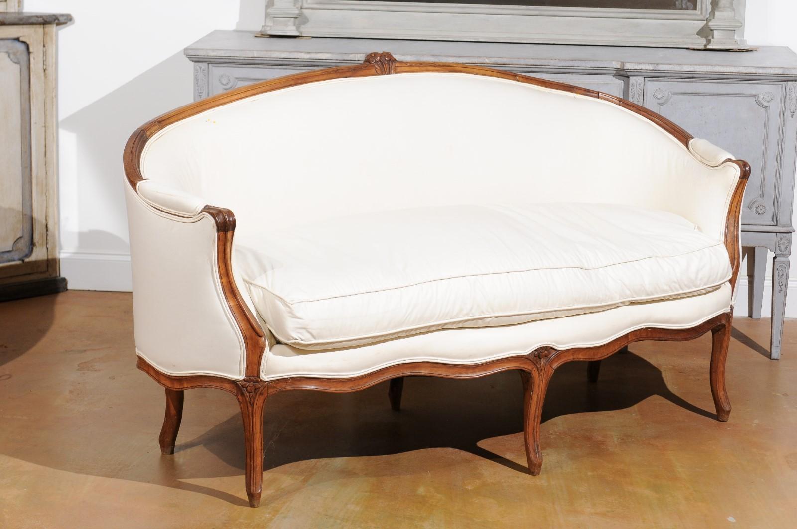 18th Century French 1740s Louis XV Period Walnut Settee with Cabriole Legs and New Upholstery