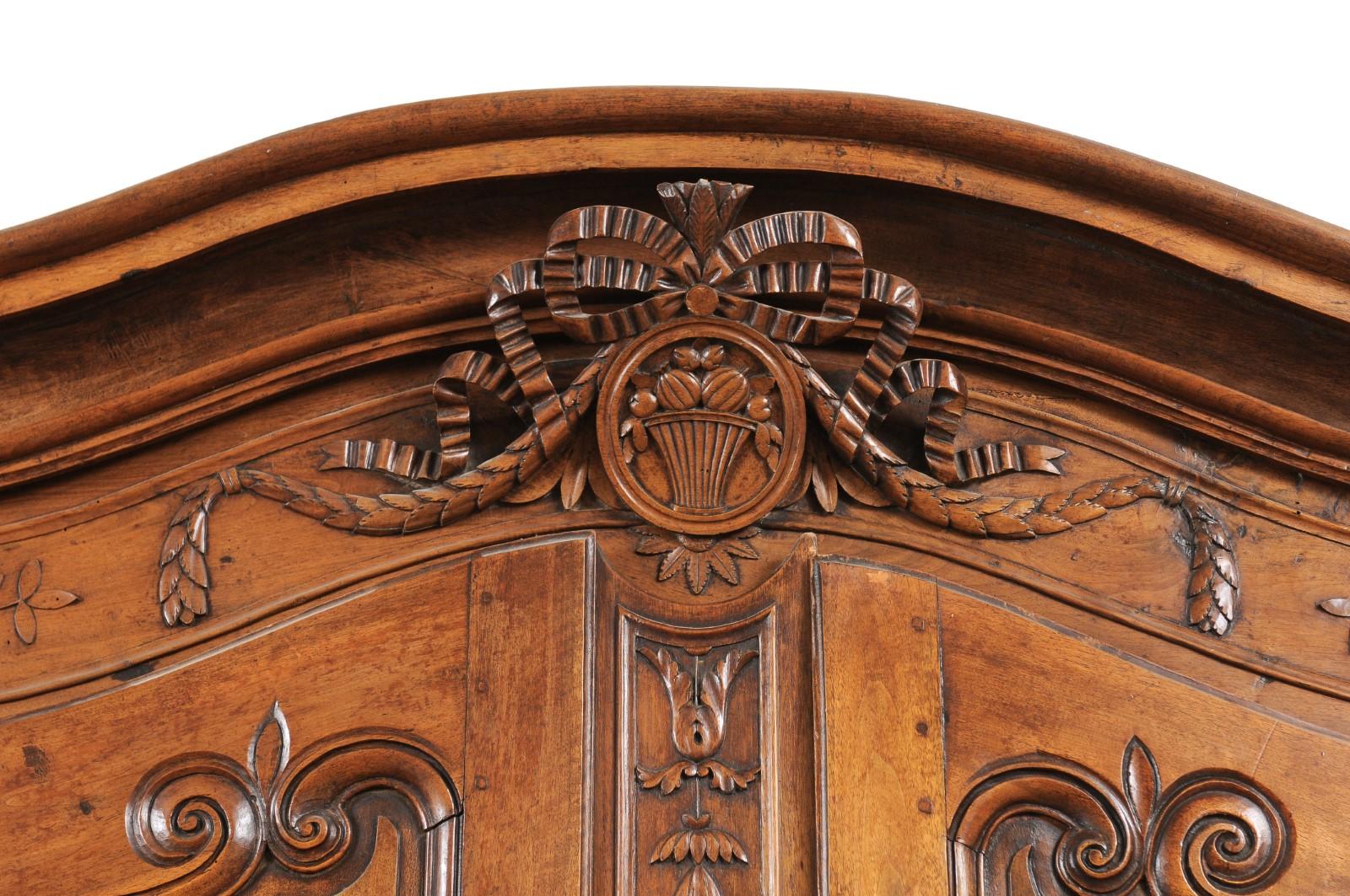 French 1740s Louis XV Walnut Armoire from Nice, with Hand Carved Foliage Décor 1