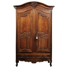 French 1750s Louis XV Period Walnut Armoire from Provence with Foliage Motifs