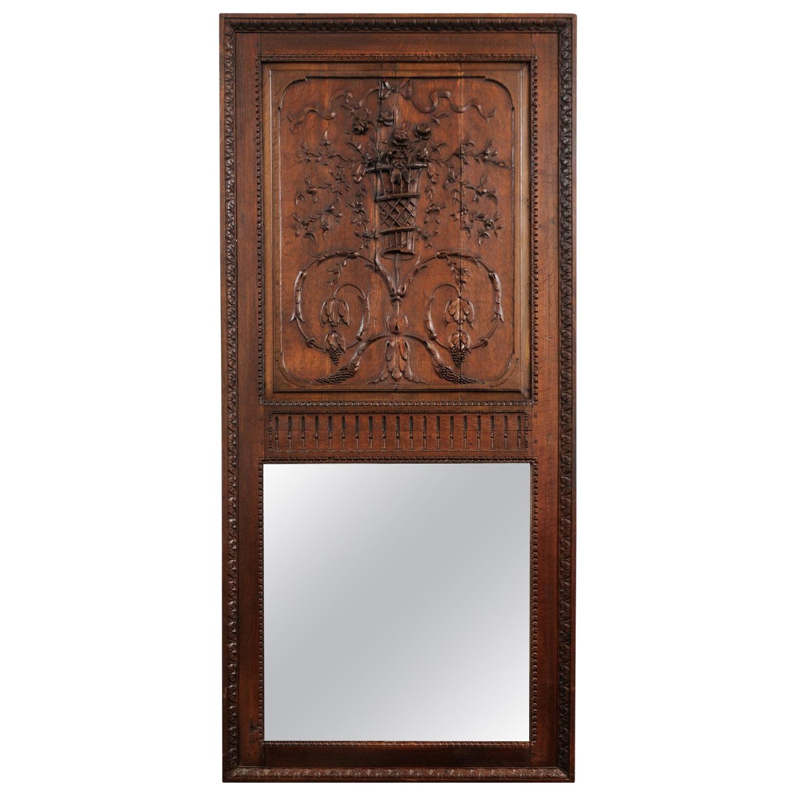 French 1750s Oak Trumeau Mirror with Large Carved Rinceaux and Floral Bouquet For Sale