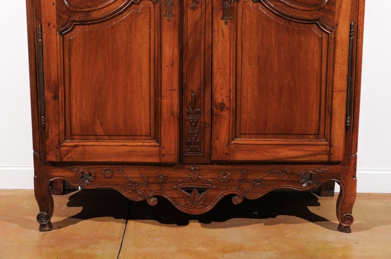 Carved French 1770s Louis XV Cherry Armoire from Provence with Basket and Kissing Doves