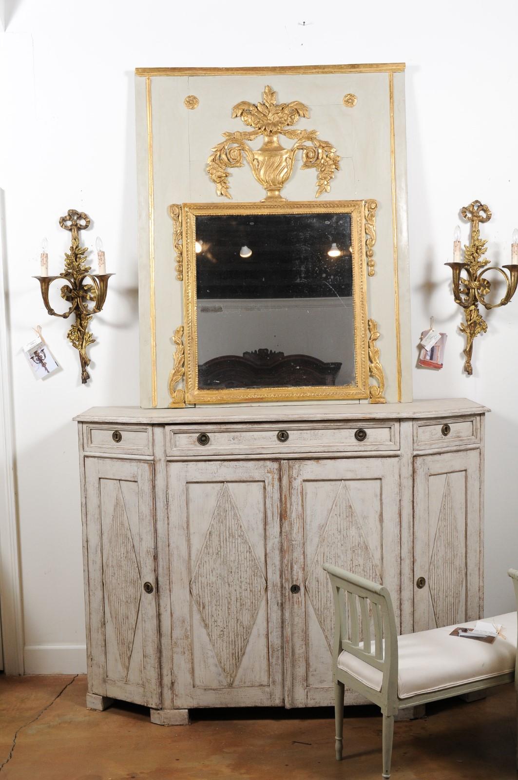 Louis XVI French 1775 Transition Period Painted and Gilt Trumeau Mirror with Carved Urn For Sale