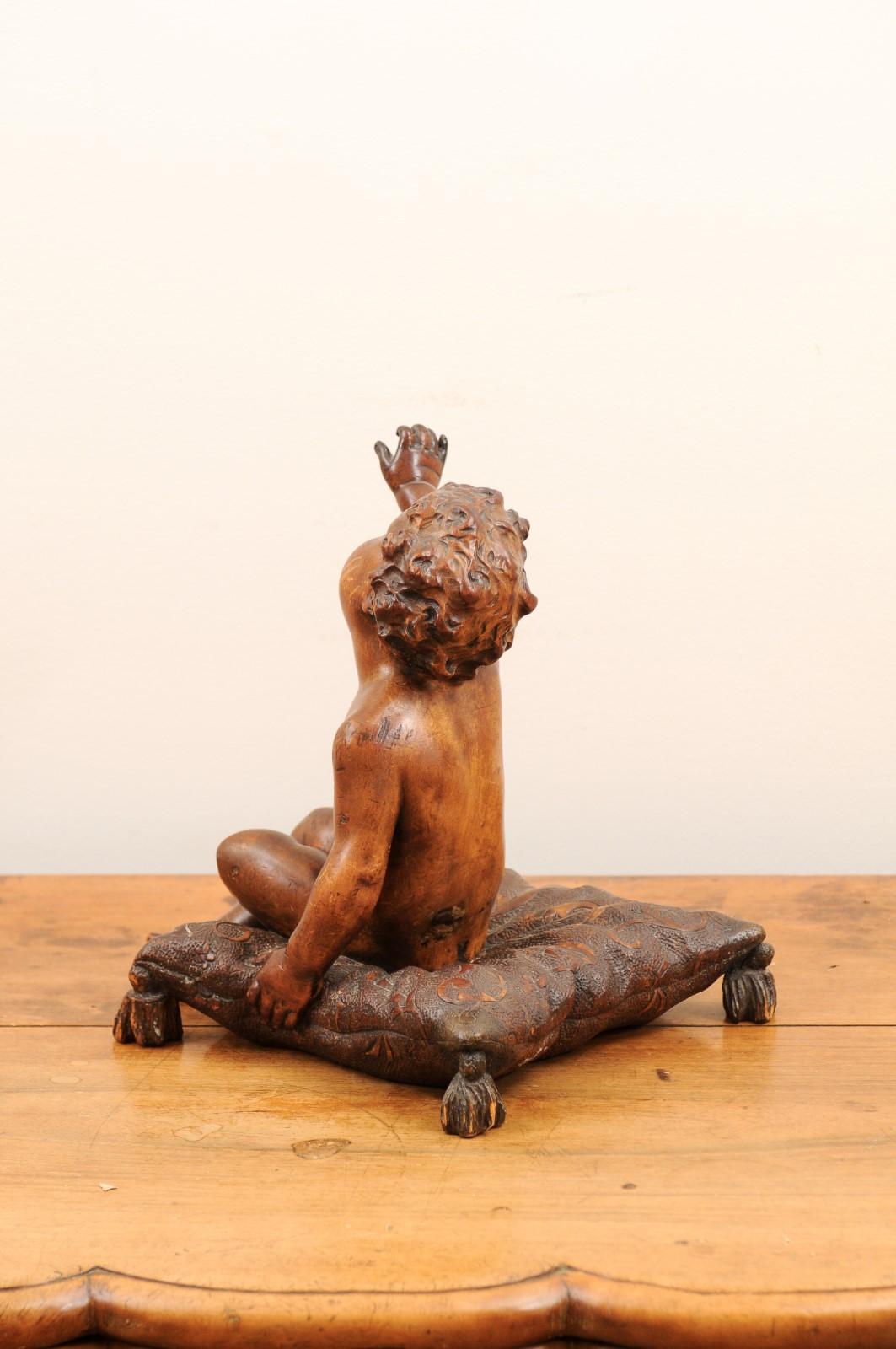 French 1780s Baroque Style Walnut Sculpture of a Putto Sitting on a Pillow For Sale 5