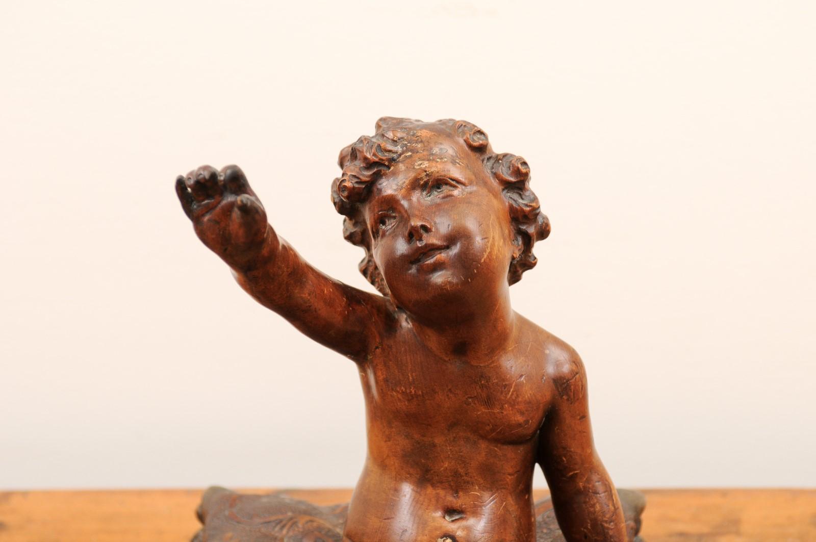 French 1780s Baroque Style Walnut Sculpture of a Putto Sitting on a Pillow In Good Condition For Sale In Atlanta, GA
