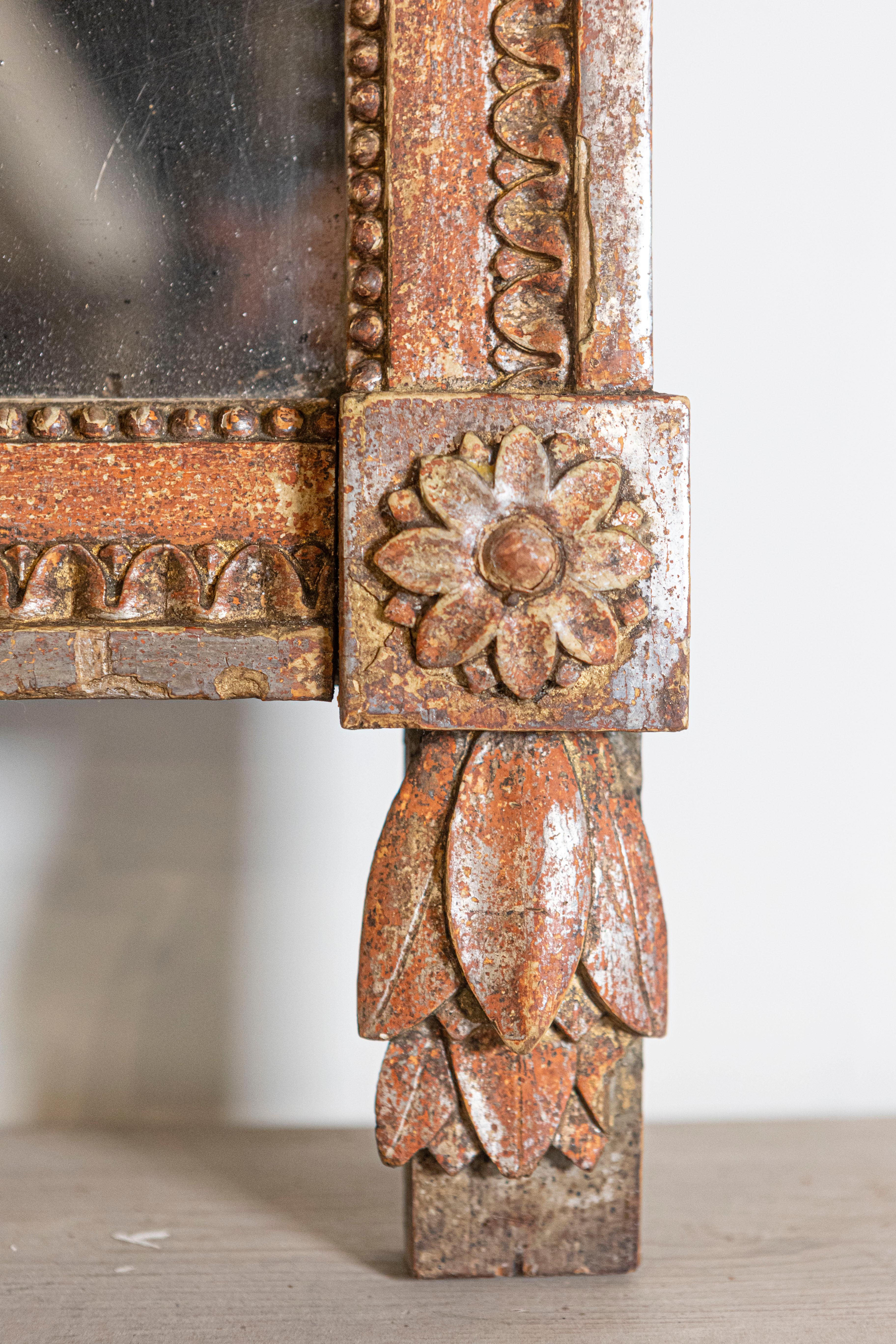 18th Century French 1790s Louis XVI Giltwood Wall Mirror with Carved Gardening Crest For Sale
