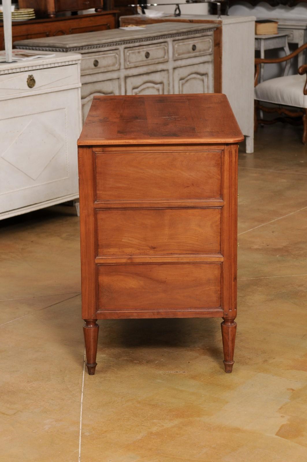 18th Century French 1790s Louis XVI Period Cherry Three-Drawer Commode with Fluted Side Posts For Sale