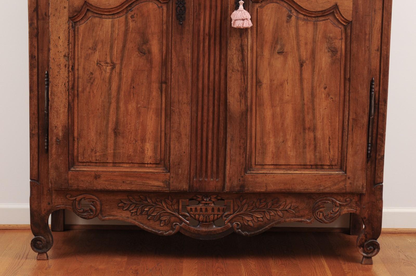 Louis XVI French 1790s Transition Walnut Armoire with Ribbon-Carved Crest and Apron