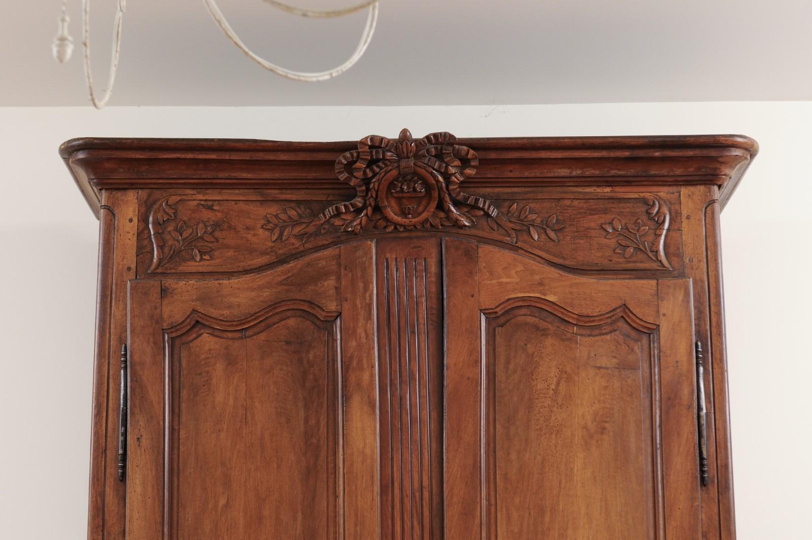 18th Century French 1790s Transition Walnut Armoire with Ribbon-Carved Crest and Apron