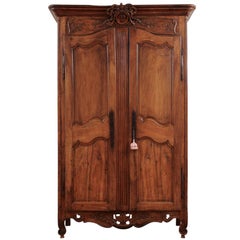 French 1790s Transition Walnut Armoire with Ribbon-Carved Crest and Apron