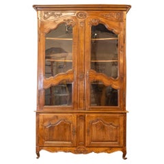Antique French 1790s Walnut Buffet à Deux-Corps with Glass Doors and Carved Motifs