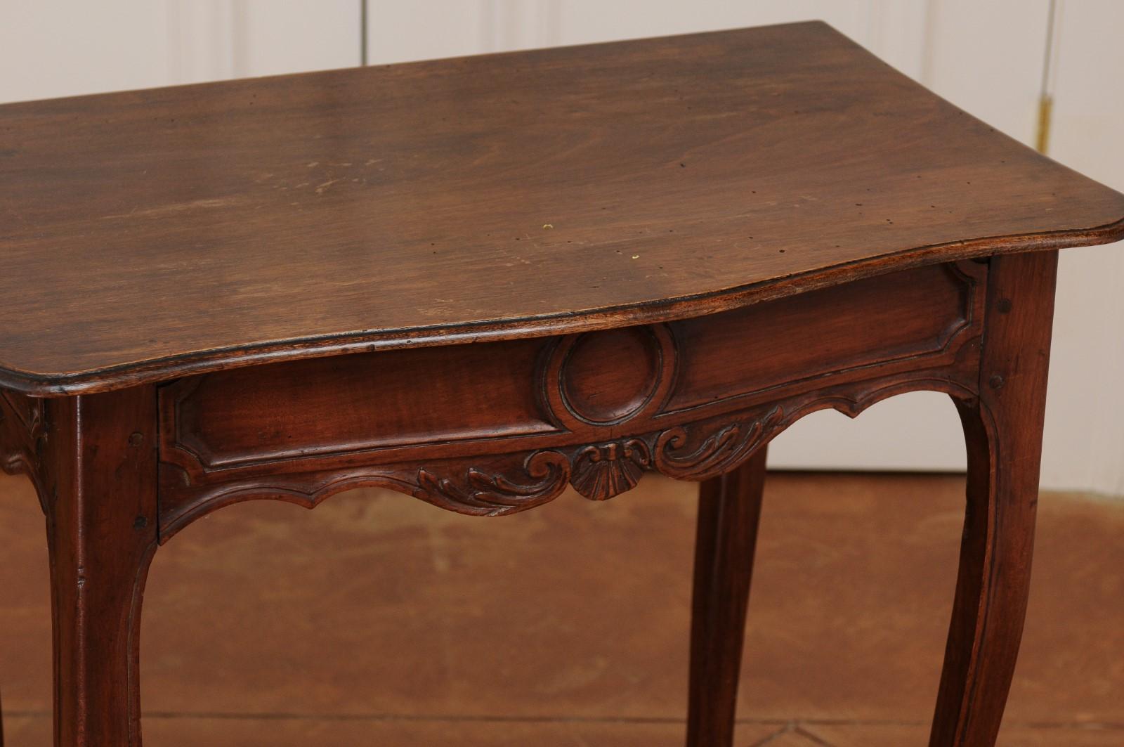 18th Century French 1790s Walnut Side Table with Side Drawer, Curving Legs and Carved Apron For Sale