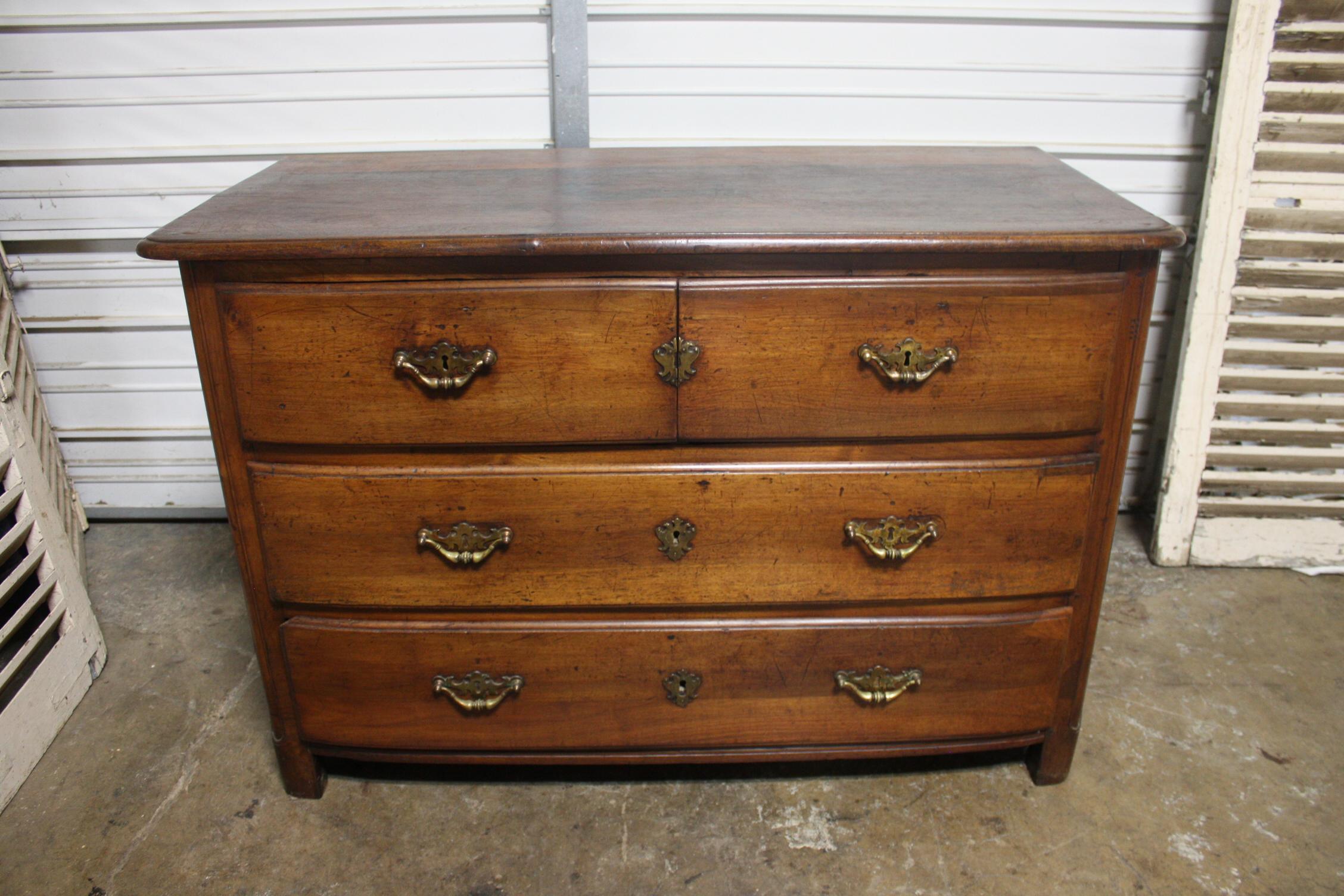 This commode wear a wonderful patine due to the age. The keyhole entry and hardware are original.
