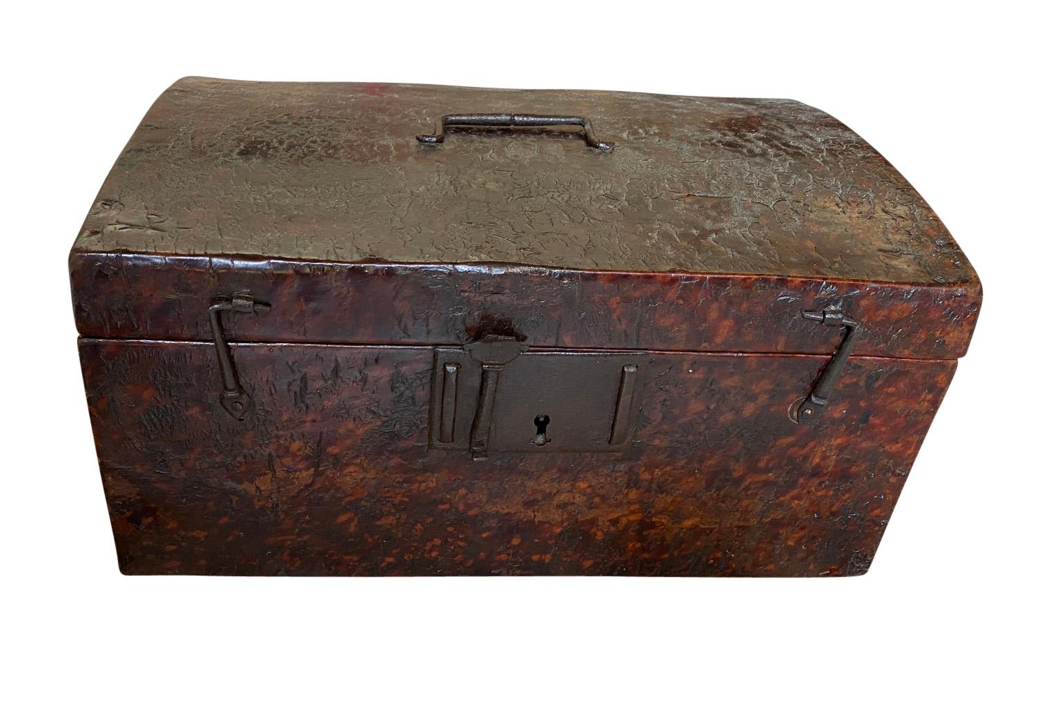 A very charming late 17th century French Coffre - Box crafted from beautifully patina'd leather. A wonderful piece to serve as a jewelry box or to adorn any table top.