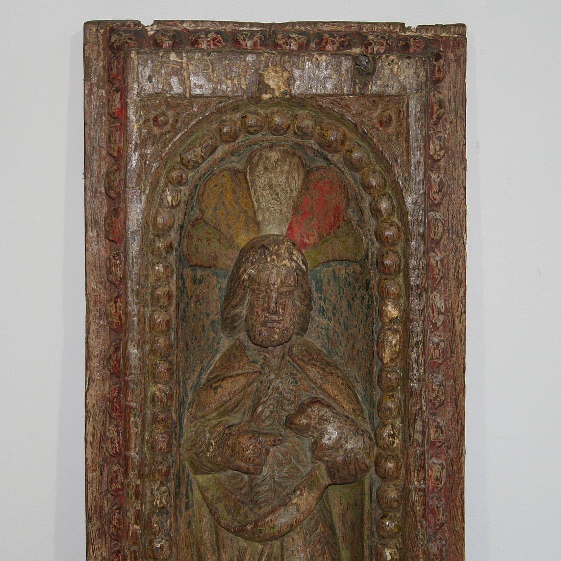Unique panel with a saint and traces of its original color,
France, circa 1650. Weathered, small losses.
 