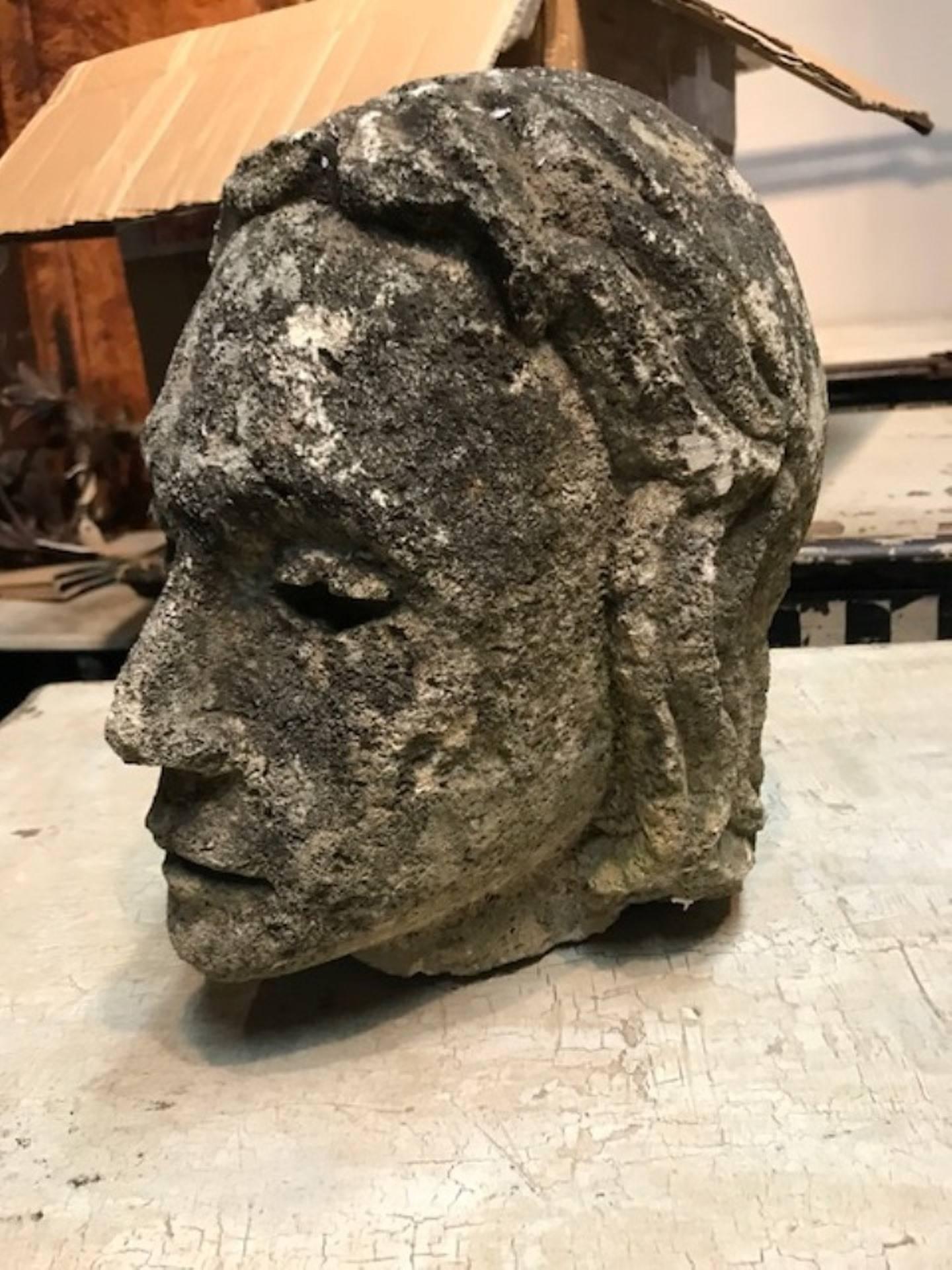 A sensational French 17th century stone carving of a head of a cardinal. Wonderful age and patina. A terrific desk or tabletop object, or placed on a pedestal or in a bookcase.