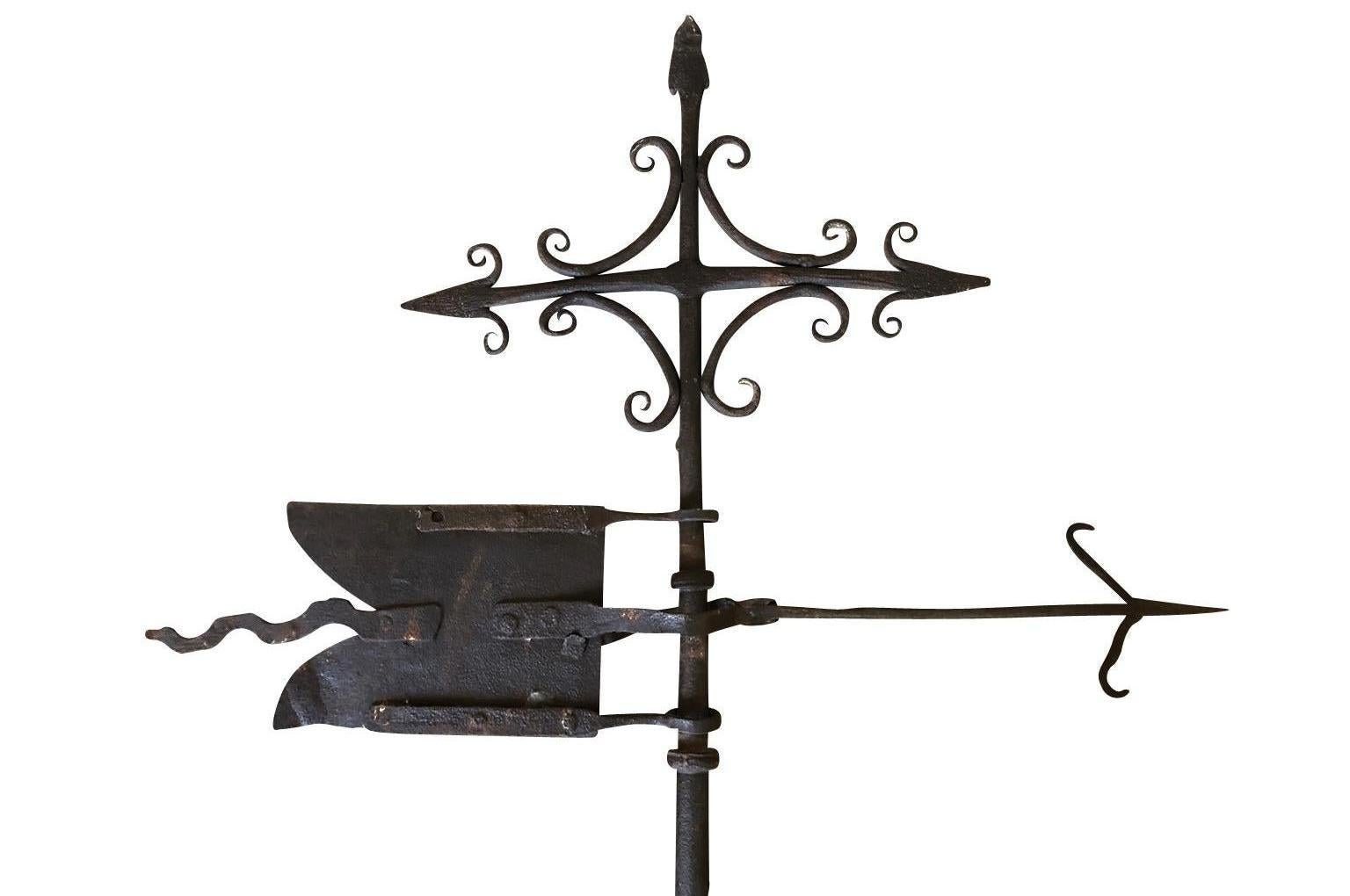 A wonderful mid-17th century Girouette, weather vane, beautifully crafted from iron. A wonderful motif of a flag and arrows.