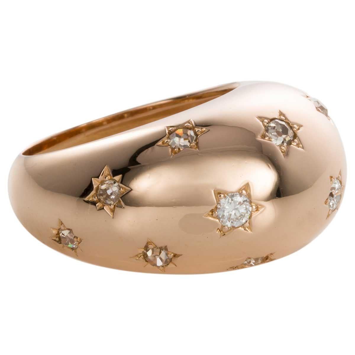 This ring ticks all the boxes. Firstly it's French and we know how beautiful the French make their jewels, secondly it has the perfect twinkle of starburst set diamonds and finally it has the most fabulous presence on the hand. These bombe rings are