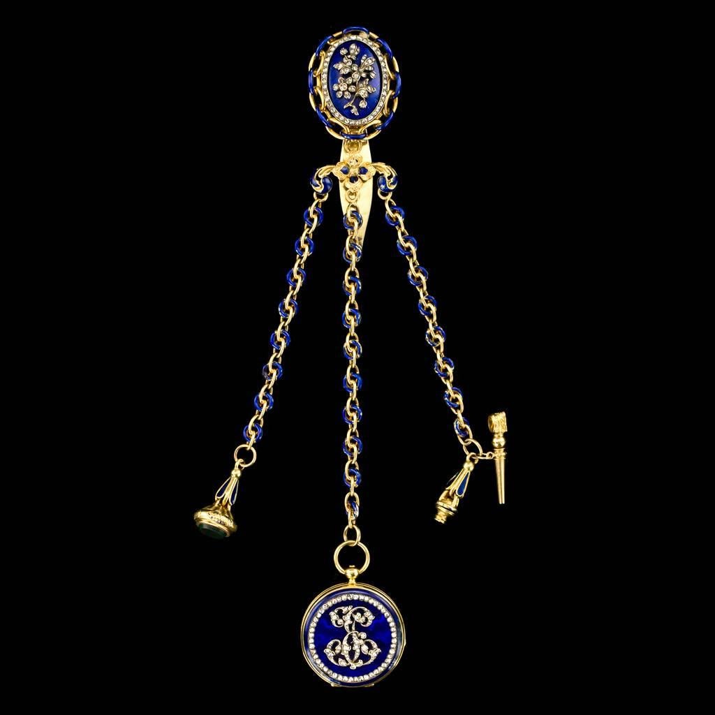 Antique early 20th century French 18-karat gold chatelaine and watch, Signed Leroy and Fils, Paris, Movement number: 34769, white enamel dial, roman numerals, chain suspended fob and keys, champlevé enamel decorated throughout, blue enamel floral