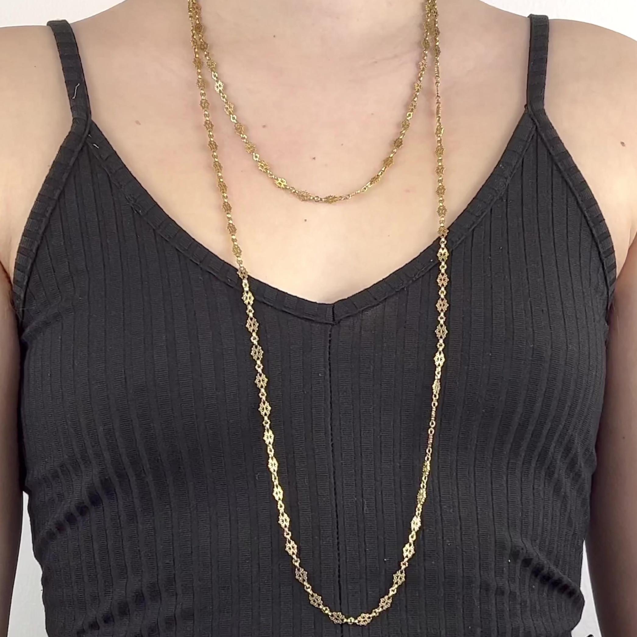 One French 55 Inch 18 Karat Gold Fancy Link Chain. Crafted in 18 karat yellow gold with French hallmarks. The necklace measures 55 inches in length. 

About this Item: Appreciate the old times with this Antique French Gold Fancy Link Chain. This