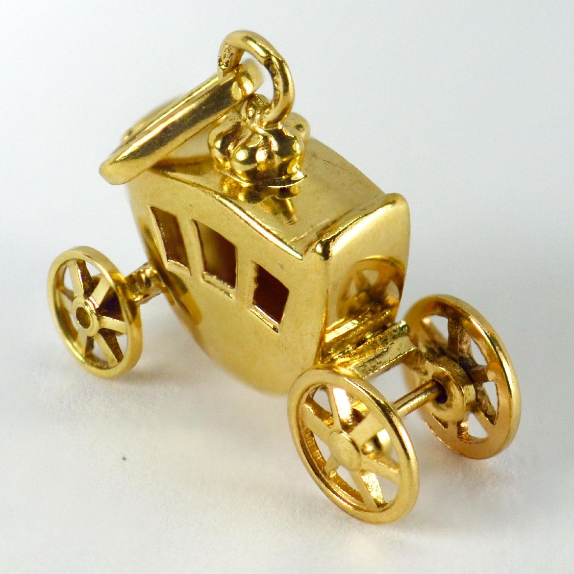 A French 18 karat (18K) yellow gold charm pendant designed as a carriage with moving wheels. Stamped with the eagles head for French manufacture and 18 karat gold with an unknown maker’s mark.

Dimensions: 1.6 x 1.8 x 0.65 cm (not including jump