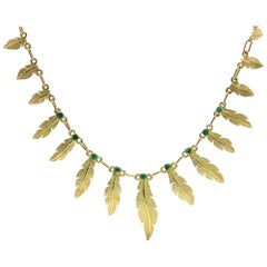 French 18 Karat Yellow Gold Emerald Feather Necklace