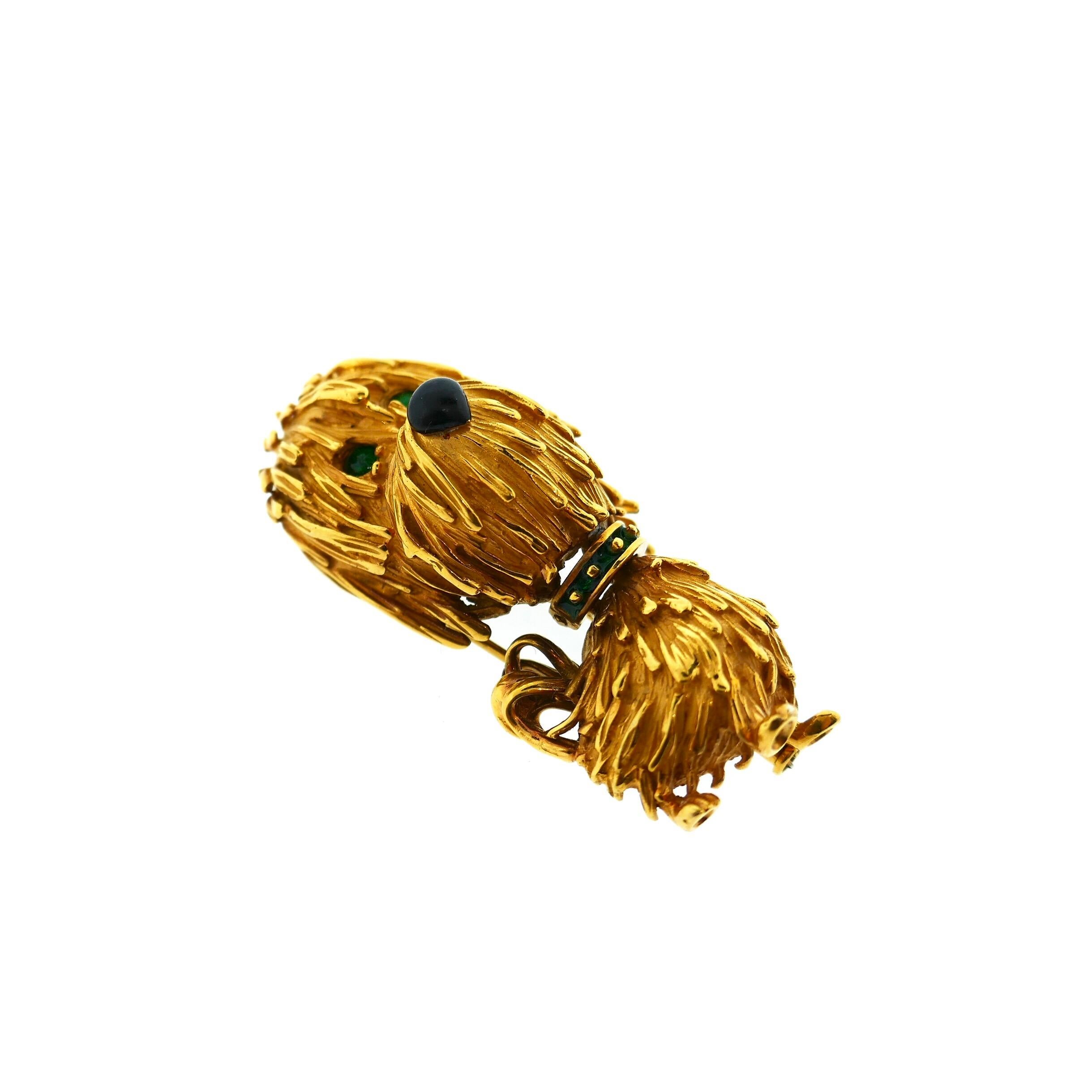 French 18 Karat Yellow Gold Enamel Onyx Dog Brooch

This brooch is made in France and is absolutely adorable.  It is crafted out of textured 18 karat yellow gold and features green enamel eyes and collar, and a black onyx nose. 

Weight: 26.8 Grams