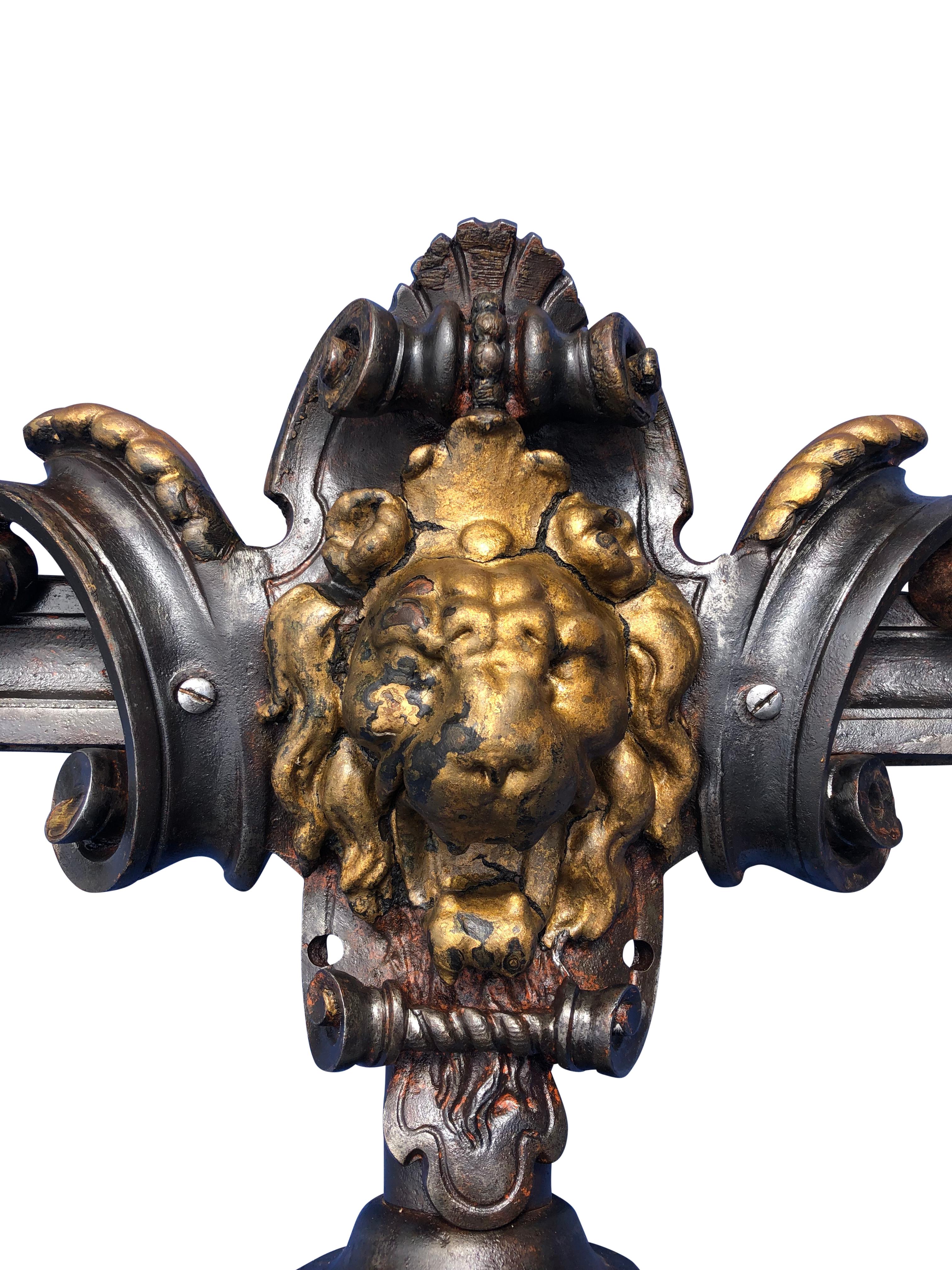 Forged French 1800s Iron and Brass Lions Head Light with Scroll and Finial Designs For Sale